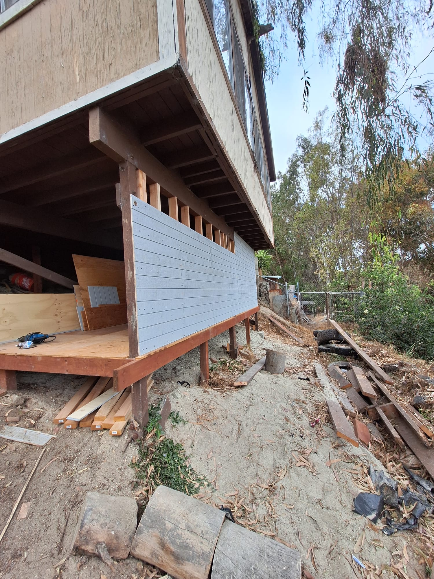 Side view of framing with siding partially installed