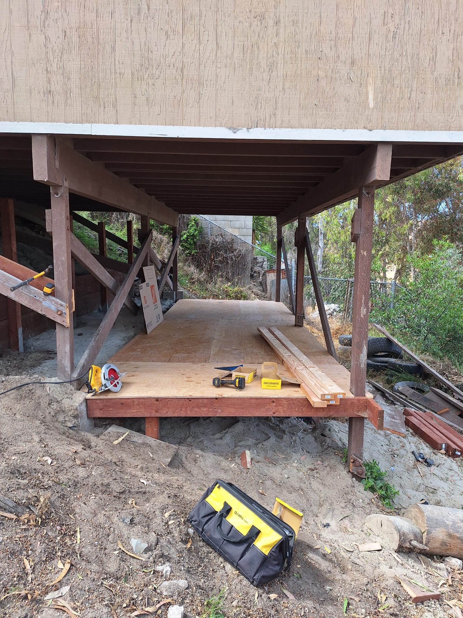 Wood joists and subfloor framing of the deck